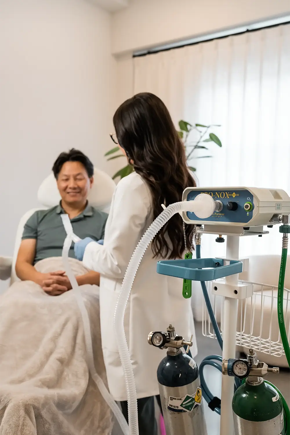 A cosmetic dermatology expert at Grayce Skin Co. provides ProNox treatment to relieve pain and anxiety.